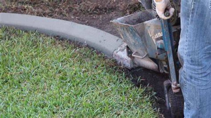How do you use a concrete curbing machine?