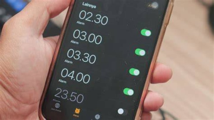Where is the alarm clock on this phone?